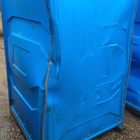 damaged mobile toilet